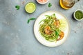 Zucchini spaghetti Pasta with basil pesto sauce and grilled shrimp, Vegetarian healthy food, place for text, top view Royalty Free Stock Photo