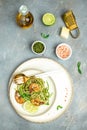 zucchini spaghetti Pasta with basil pesto sauce and grilled shrimp, Vegetarian healthy food, place for text, top view Royalty Free Stock Photo