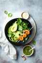 Zucchini spaghetti with pesto sauce and grilled shrimp skewers. Vegetarian vegetable low carb pasta. Zucchini noodles or zoodles. Royalty Free Stock Photo