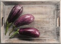 zucchini speckled on a wooden tray