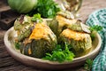 Zucchini stuffed with minced meat, cheese and green herbs. Royalty Free Stock Photo