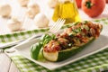 Zucchini stuffed with minced meat, cheese and mushroom. Baked in oven. Royalty Free Stock Photo