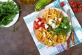 Zucchini waffles with goat cheese, tomatoes, arugula. Proper nutrition. Healthly food. The top view