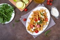 Zucchini waffles with goat cheese, tomatoes, arugula. Proper nutrition. Healthly food. The top view