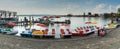 Zug, ZG / Switzerland - 20 April, 2019: panorama view of Lake Zug lake shore with the paddle boat rental station on a beautiful