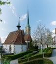 Zug, ZG / Switzerland - 20 April, 2019: view of the historic church of Saint Oswald in the city of Zug on a beautiful spring