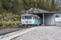 Zugspitze, Germany - Aug 5, 2020: Glacier cogwheel train come out of Riffelriss station