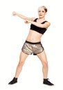 Zumba fitness dancer. Blonde hair fashion model on white background.