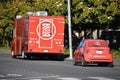 Zume Pizza mobile kitchen truck and small delivery Fiat vehicle parked on the street