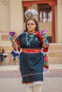 Zuni Indian, a Pueblo woman balances pot on her head in ceremony in Gallup, New Mexico, July 21, 2016 - Government Center Plaza