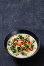 Zuppa Toscana,Tuscan Soup in black bowl, top view Royalty Free Stock Photo