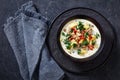 Zuppa Toscana,Tuscan Soup in black bowl, top view Royalty Free Stock Photo