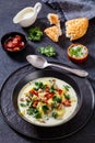 Zuppa Toscana,Tuscan Soup in black bowl, top view Royalty Free Stock Photo