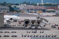 Zurich airport panoramic landscape at day time, ladders, luggage trolleys and other airport special machines