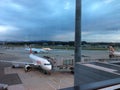 Zurich-Airport, Switzerland, Parking Planes in the evening twilight Royalty Free Stock Photo