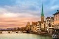 Zurich city center, Switzerland. Zuerich old town with famous Fraumunster and Munsterbrucke bridge on bank of river