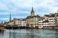 Zurich city center, Switzerland. Zuerich old town with famous Fraumunster and St. Peter Church on bank of river Limmat Royalty Free Stock Photo