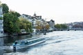 Zurich City Panorama with limmat river and small cruise ship Royalty Free Stock Photo