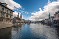 03-08-2023 Zurich city Switzerland. Bridge side view of the famous Grossmunster and Fraumunster cathedral towers on either side Royalty Free Stock Photo