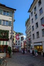 03-08-2023 Zurich city Switzerland. Pedestrian shopping street in the old part of town. Sunny summer day, tourists walking on the Royalty Free Stock Photo