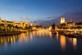 Zurich downtown skyline with Fraumunster and Grossmunster churches at lake zurich at night, Switzerland Royalty Free Stock Photo