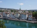 Scenic houses on bank of Limmat river and european cityscape landscape of Zurich city in Switzerland