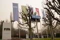 Entrance of the FIFA headquarters with flags and signpost of the organization.