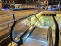 Illuminated escalator to the railway station area