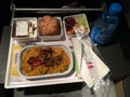 ZURICH, SWITZERLAND - MAR 31st, 2015: In flight hot meal of SWISS international airline in economy class, dinner meal