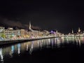 Zurich Switzerland night cityscape seen from the river Limat Royalty Free Stock Photo