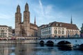 ZURICH, SWITZERLAND - 28 OCTOBER 2015 : Sunset view Grossmunster church in Limmat River, City of Zurich Royalty Free Stock Photo