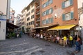 31-05-2023 Zurich, Switzerland. Tourists enjoying food on the terrace of restaurants in historic downtown