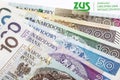 ZUS - Polish Social Insurance Institution - on the background of the Polish Zloty