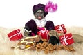 Zwarte Piet with presents and sweets Royalty Free Stock Photo