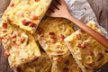 Zwiebelkuchen pie with onions, bacon and cheese macro on the tab