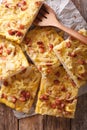 Zwiebelkuchen pie with onions, bacon and cheese macro on the tab