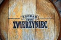 Wooden barrell with logo of brewery in Zwierzyniec, Poland