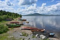 Zyuratkul lake coast with fisherman boats