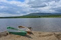 Zyuratkul lake scenic landscape with two boats