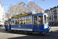 ZÃÂ¼rich-City: An oldtimer tram is curving around Stadelhofen train station