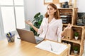 ÃÂ¡Young caucasian businesswoman meditating doing yoga exercise at the office Royalty Free Stock Photo