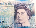 ÃÂ£5 pound note close up for QueenÃ¢â¬â¢s face Royalty Free Stock Photo