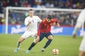 ÃÂlvaro Morata of Spain is challenged by Ingi Bjarnason of Iceland