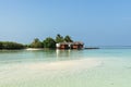 Ãâeautiful wooden villas, standing on stilts in the turquoise water of the Indian Ocean, Maldives Royalty Free Stock Photo