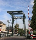 Ãâld steel drawbridge over river Hollandse IJssel in the city of Haastrecht