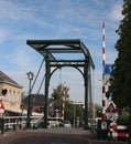 Ãâld steel drawbridge over river Hollandse IJssel in the city of Haastrecht in the Netherlands