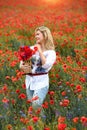 ÃÂ happy young a woman in a white shirt with a floral print and jeans Royalty Free Stock Photo