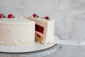 ÃÂ piece of white cake with milk cream mousse and raspberry filling Royalty Free Stock Photo