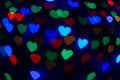 ÃÂbstract sweet colorful heart shaped bokeh. Street light blurred background. Valentine`s day and love concept