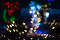 ÃÂbstract sweet colorful heart shaped bokeh. Street light blurred background. Valentine`s day and love concept